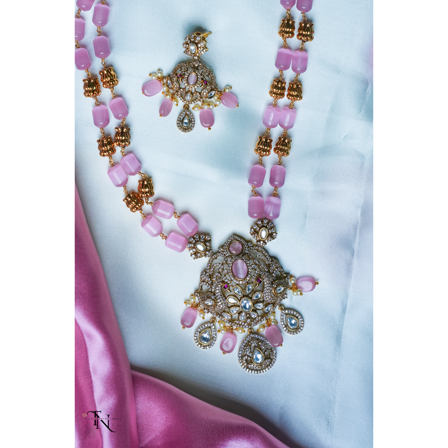 Elegant Light Pink Bead Necklace with Gold Accents and Pendant